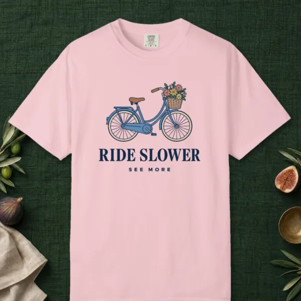 ride-slower-see-more-tee-blossom-front Ride Slower See More design on a Blossom Comfort Colors 1717 tee, laid flat