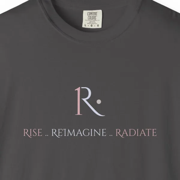 rise-reimagine-radiate-tee-graphite-chest Close-up of the Rise Reimagine Radiate print on a Graphite Comfort Colors 1717 tee