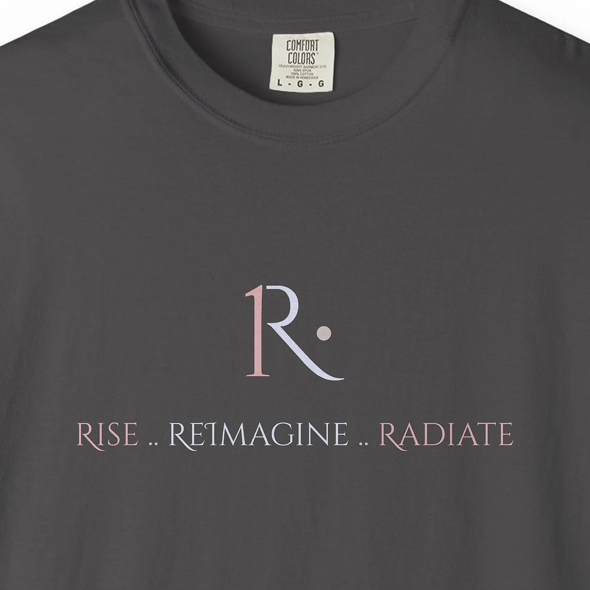 rise-reimagine-radiate-tee-graphite-chest Close-up of the Rise Reimagine Radiate print on a Graphite Comfort Colors 1717 tee
