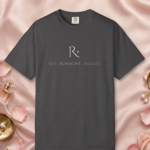 rise-reimagine-radiate-tee-graphite-front Rise Reimagine Radiate design on a Graphite Comfort Colors 1717 tee, laid flat