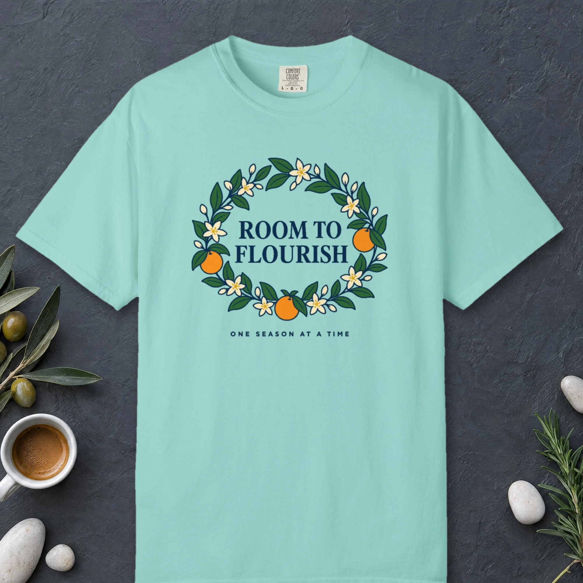 Room to Flourish design on a Chalky Mint Comfort Colors 1717 tee, laid flat