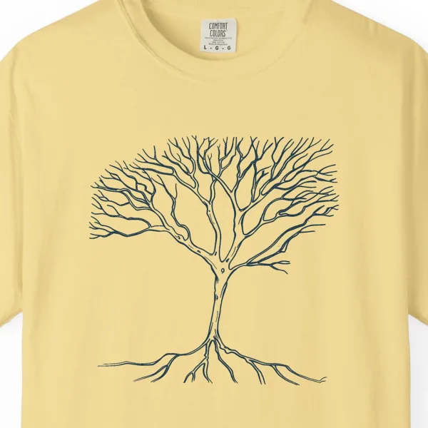 Close-up of the Roots and Branches print on a Butter Comfort Colors 1717 tee