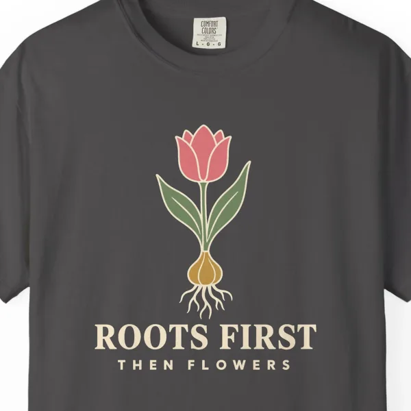 roots-first-tee-graphite-chest Close-up of the Roots First print on a Graphite Comfort Colors 1717 tee