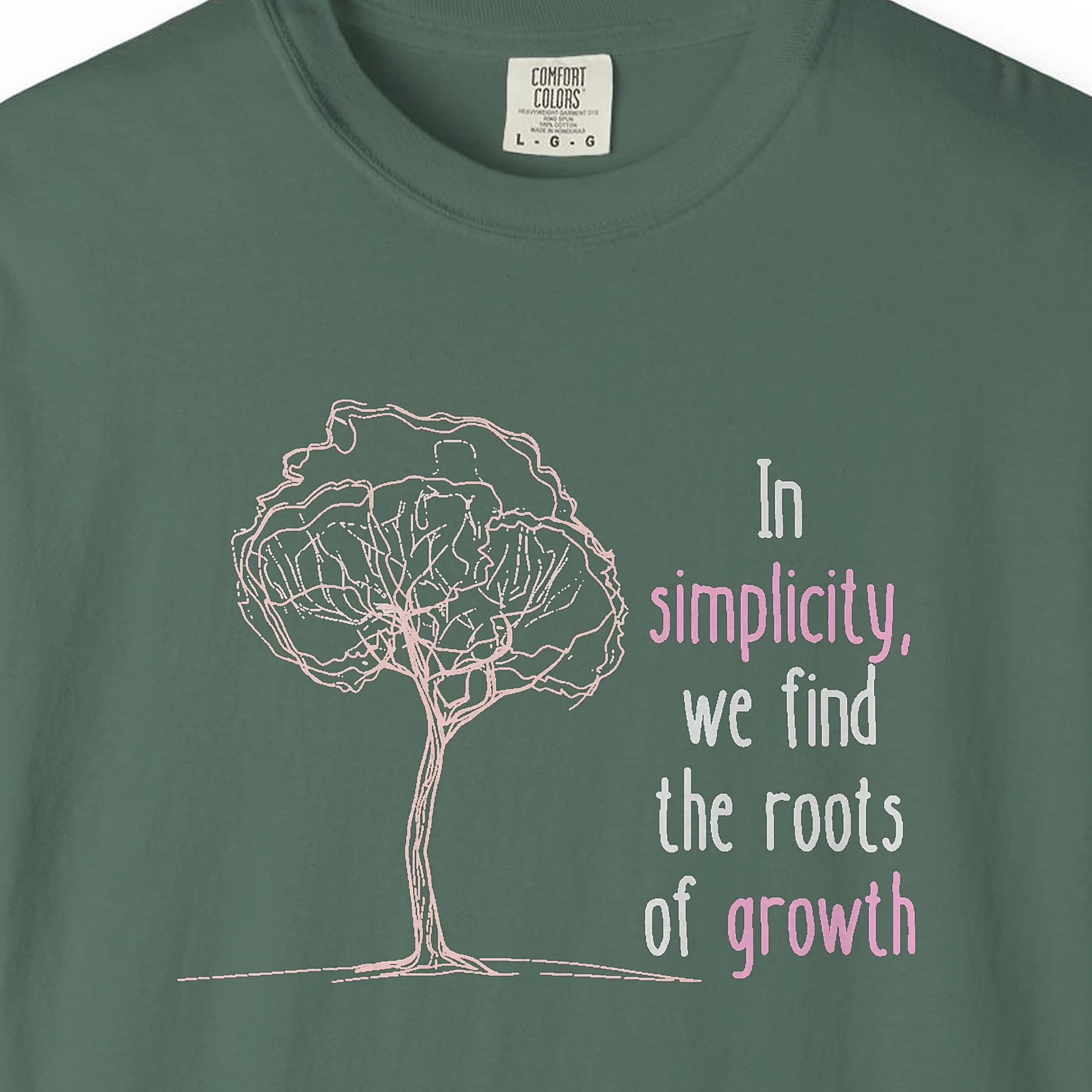 Close-up of the Roots of Growth print on a Blue Spruce Comfort Colors 1717 tee