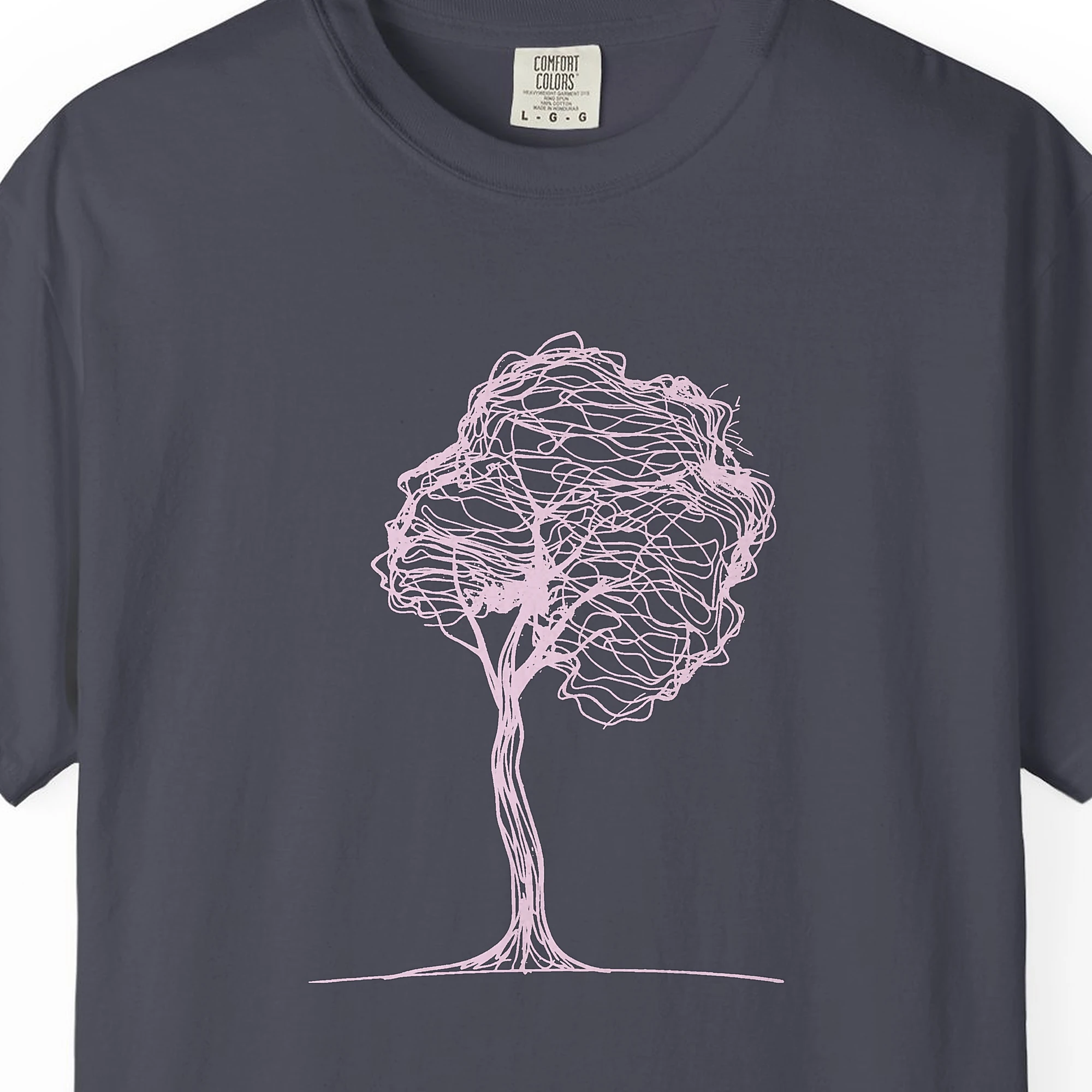 round-crown-tree-tee-navy-chest Close-up of the Round Crown Tree print on a Navy Comfort Colors 1717 tee