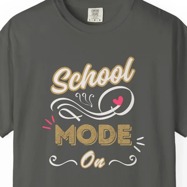 Close-up of the School Mode On print on a Pepper Comfort Colors 1717 tee