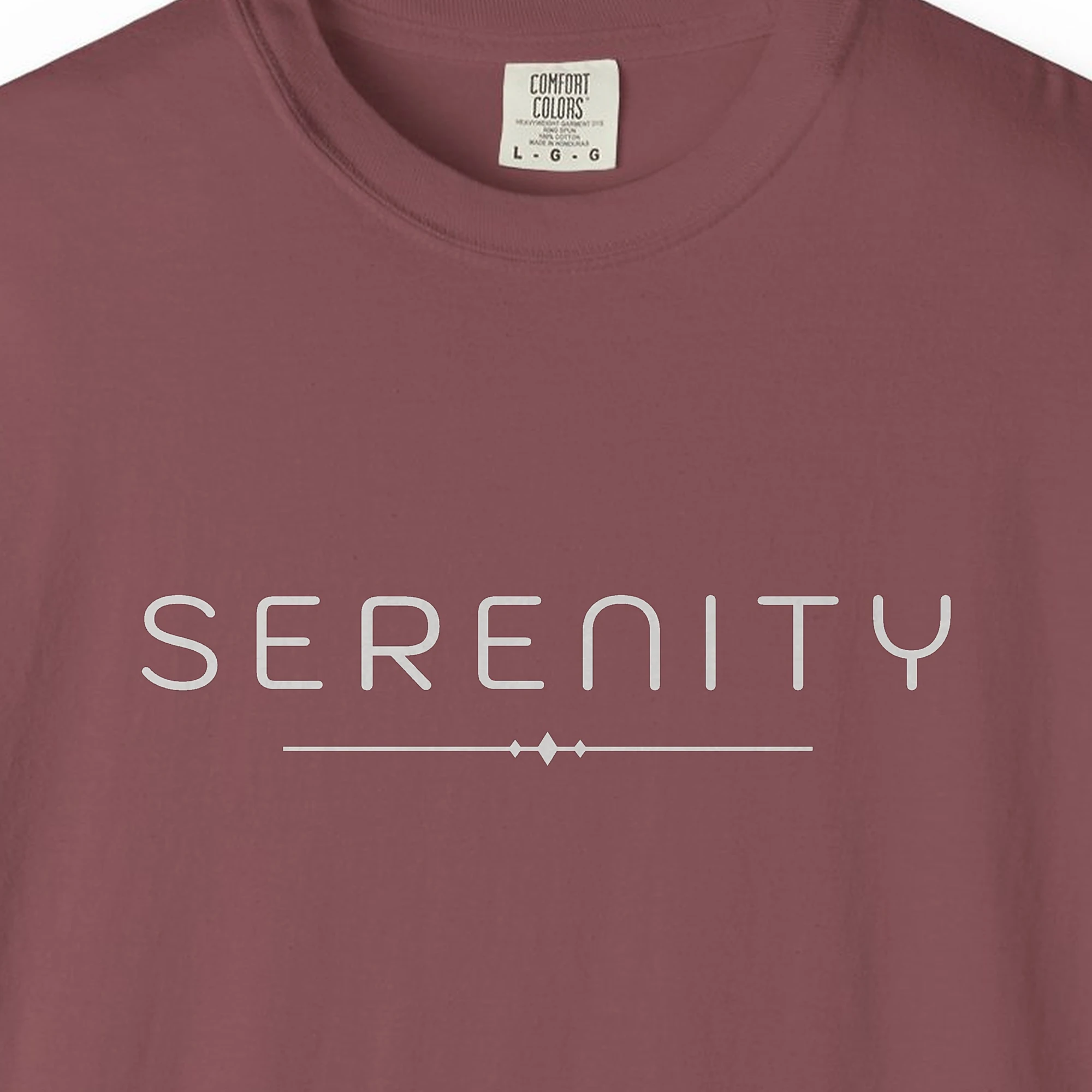 Close-up of the Serenity Diamond Line print on a Brick Comfort Colors 1717 tee