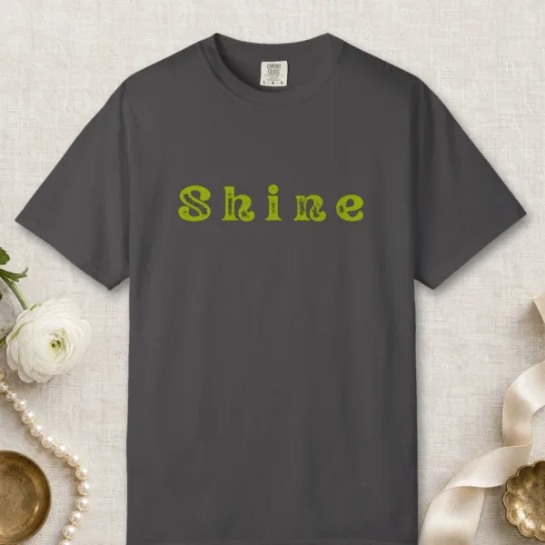 shine-tee-graphite-front Shine design on a Graphite Comfort Colors 1717 tee, laid flat