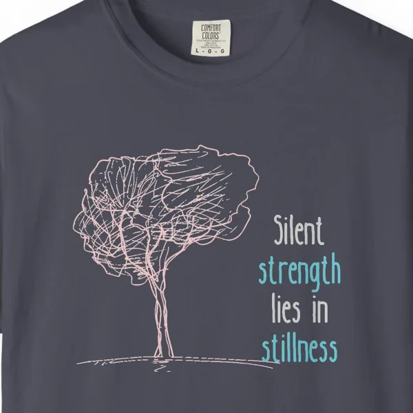 Close-up of the Silent Strength print on a Navy Comfort Colors 1717 tee