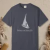 Silver Sailboat design on a Navy Comfort Colors 1717 tee, laid flat