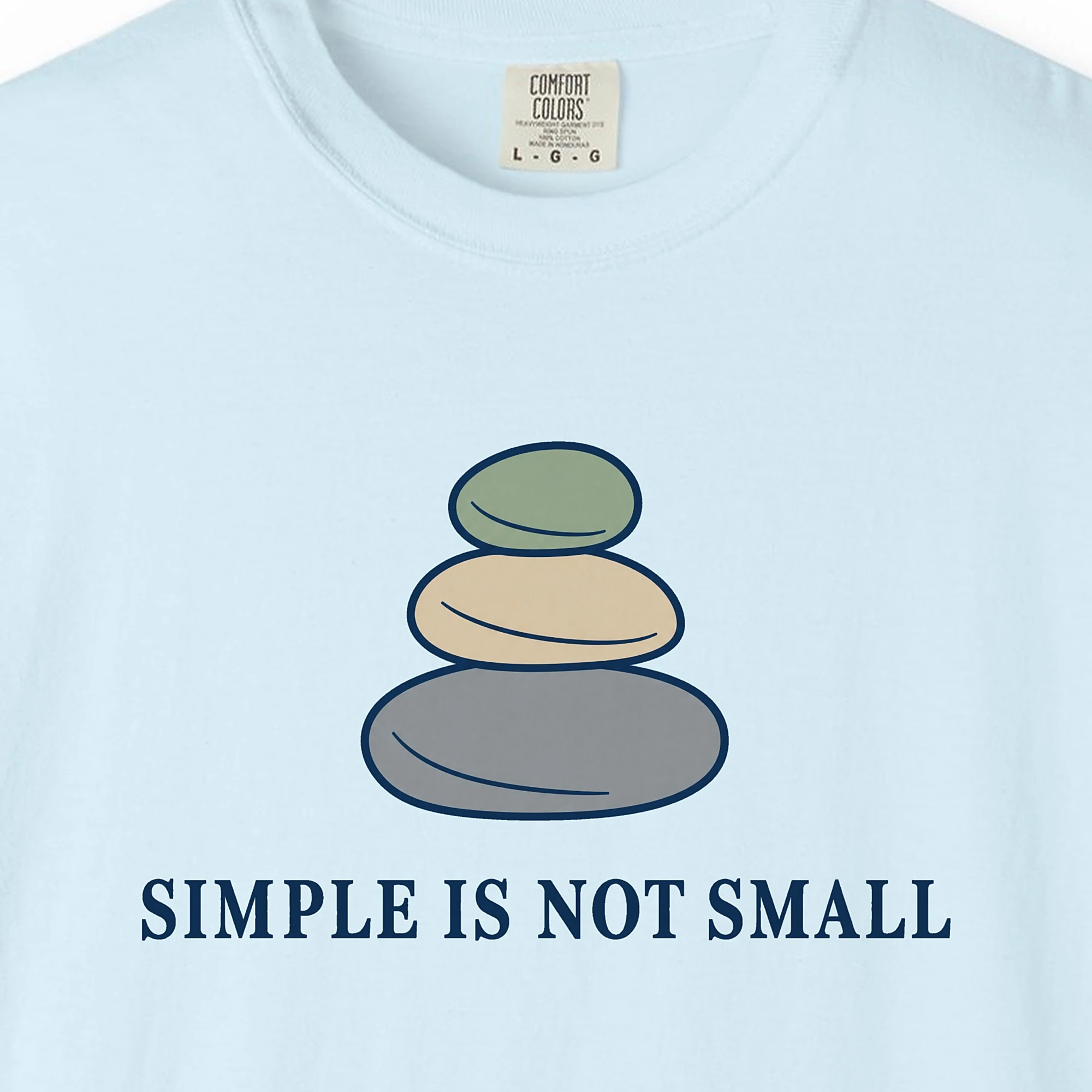 simple-is-not-small-tee-chambray-chest Close-up of the Simple Is Not Small print on a Chambray Comfort Colors 1717 tee
