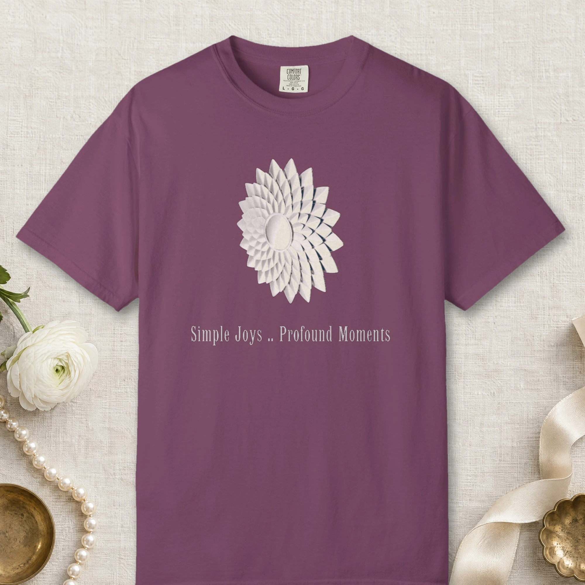 Simple Joys Profound Moments design on a Berry Comfort Colors 1717 tee, laid flat