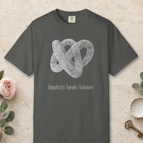 simplicity-speaks-volumes-tee-pepper-front Simplicity Speaks Volumes design on a Pepper Comfort Colors 1717 tee, laid flat