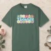Smiling Daisies Teacher design on a Blue Spruce Comfort Colors 1717 tee, laid flat