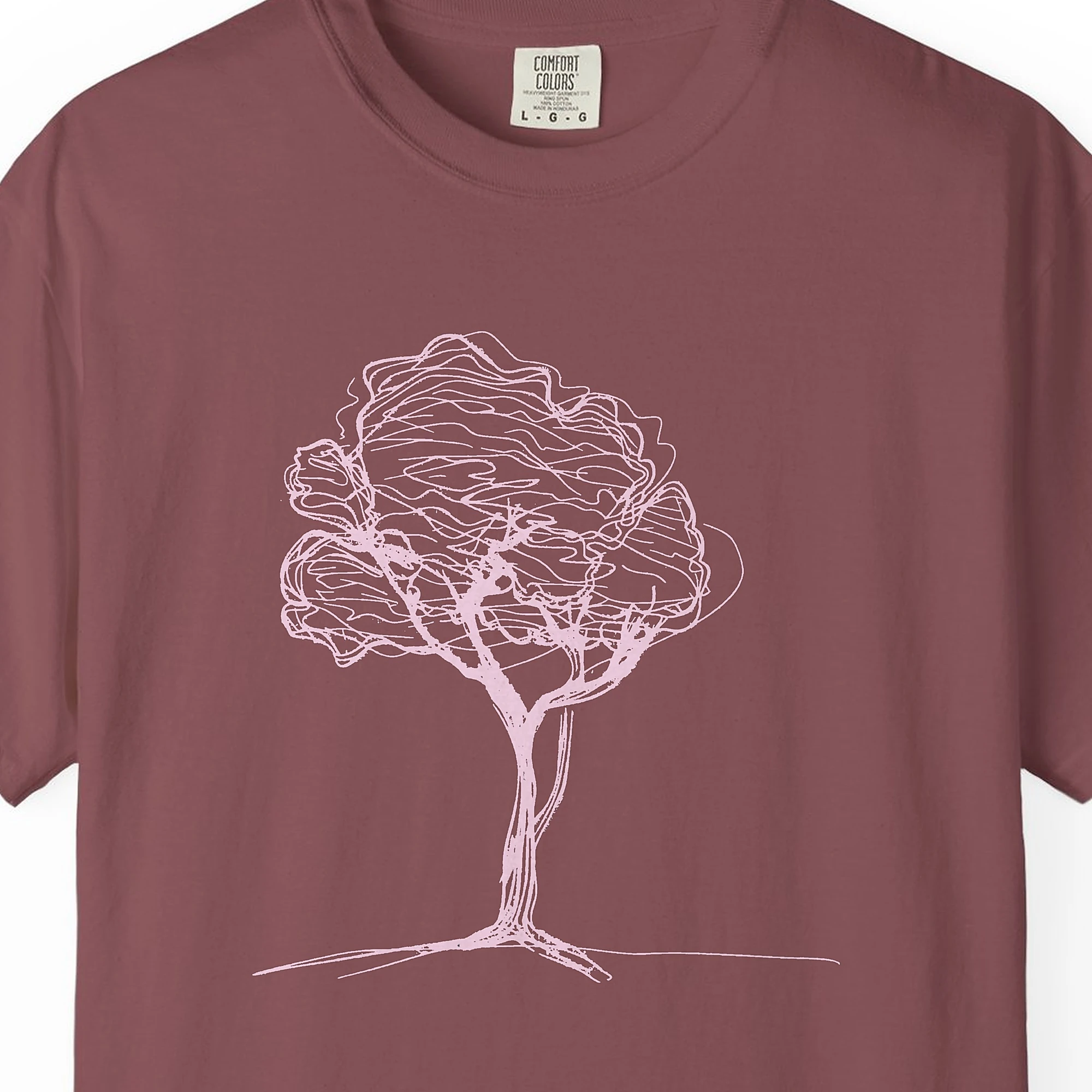 soft-canopy-tree-tee-brick-chest Close-up of the Soft Canopy Tree print on a Brick Comfort Colors 1717 tee
