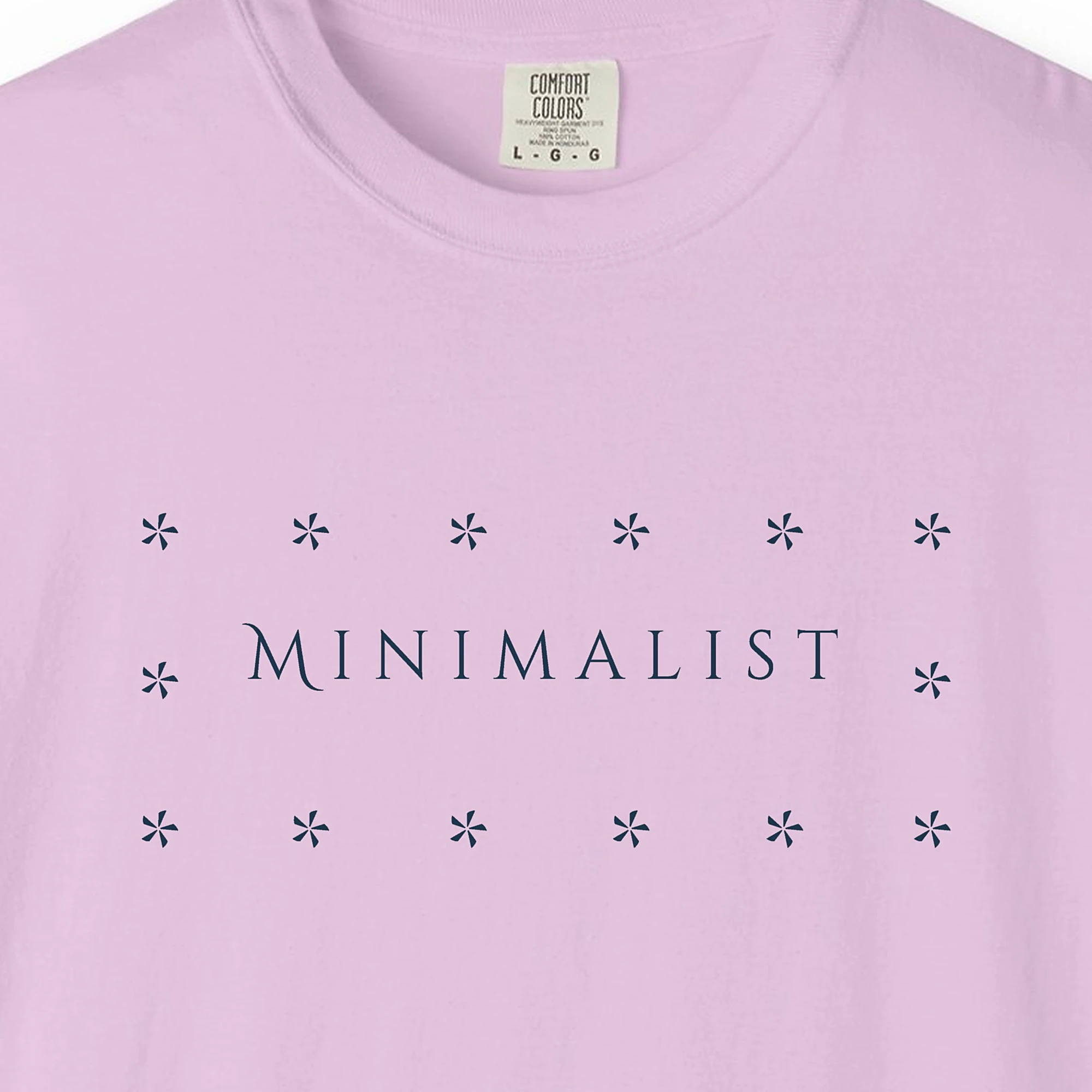 Close-up of the Star Band Line print on a Orchid Comfort Colors 1717 tee