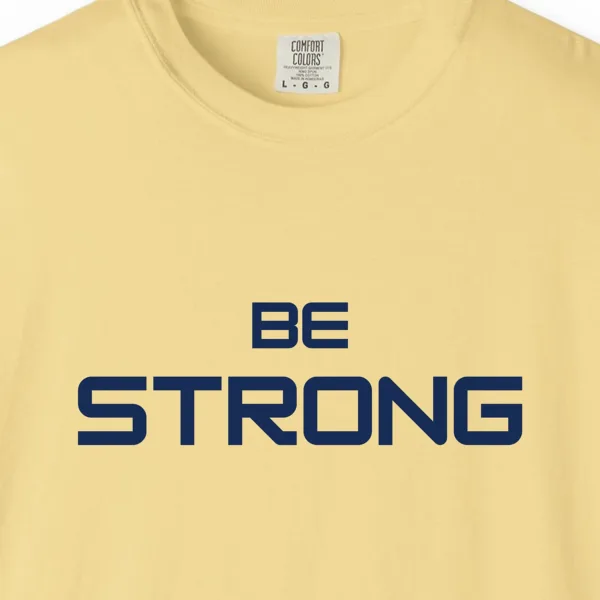 Close-up of the Steady Strength print on a Butter Comfort Colors 1717 tee