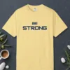 Steady Strength design on a Butter Comfort Colors 1717 tee, laid flat