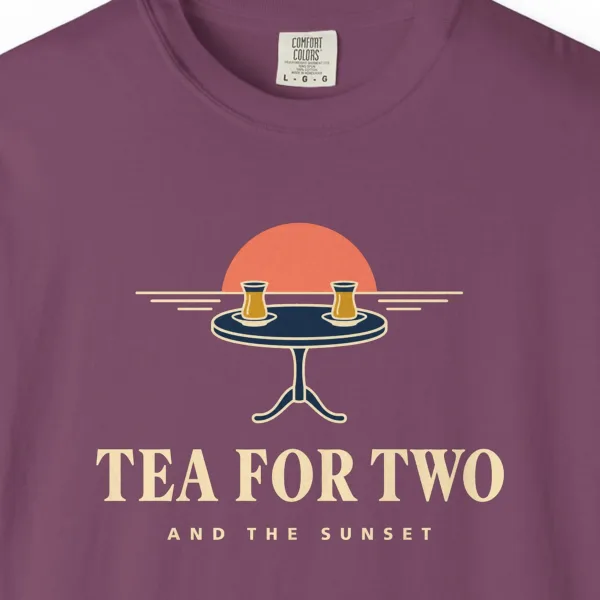 tea-for-two-and-the-sunset-tee-berry-chest Close-up of the Tea for Two and the Sunset print on a Berry Comfort Colors 1717 tee