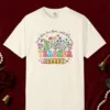 Teach Them Love Them design on a Ivory Comfort Colors 1717 tee, laid flat