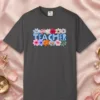 teacher-in-flowers-tee-graphite-front Teacher in Flowers design on a Graphite Comfort Colors 1717 tee, laid flat