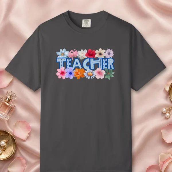 teacher-in-flowers-tee-graphite-front Teacher in Flowers design on a Graphite Comfort Colors 1717 tee, laid flat