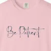 the-patient-heart-tee-blossom-chest Close-up of the The Patient Heart print on a Blossom Comfort Colors 1717 tee