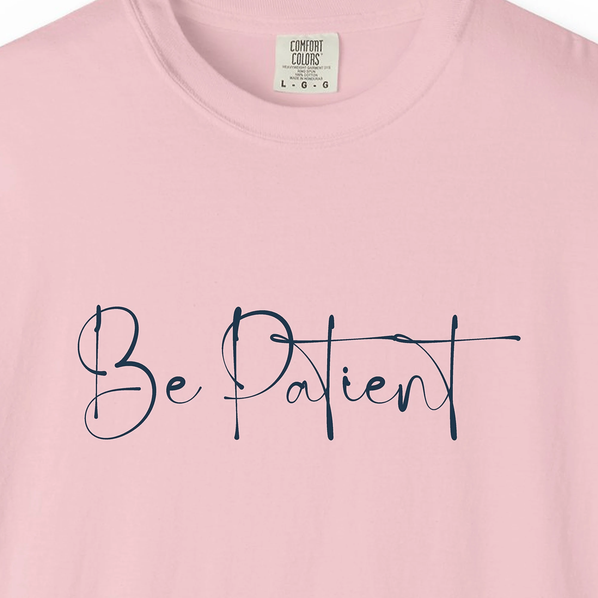 Close-up of the The Patient Heart print on a Blossom Comfort Colors 1717 tee
