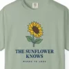 the-sunflower-knows-tee-bay-chest Close-up of the The Sunflower Knows print on a Bay Comfort Colors 1717 tee