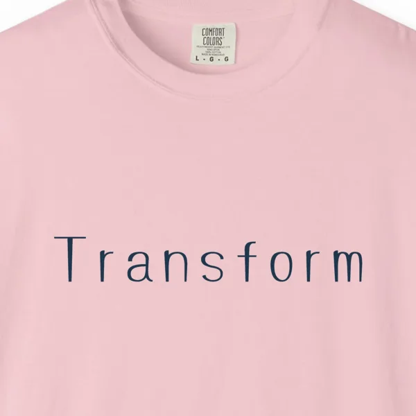 Close-up of the Transform Fine Line print on a Blossom Comfort Colors 1717 tee
