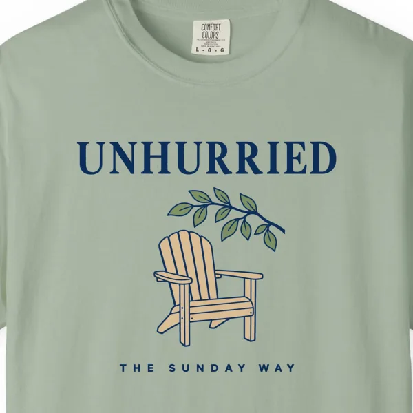 Close-up of the Unhurried Sunday print on a Bay Comfort Colors 1717 tee