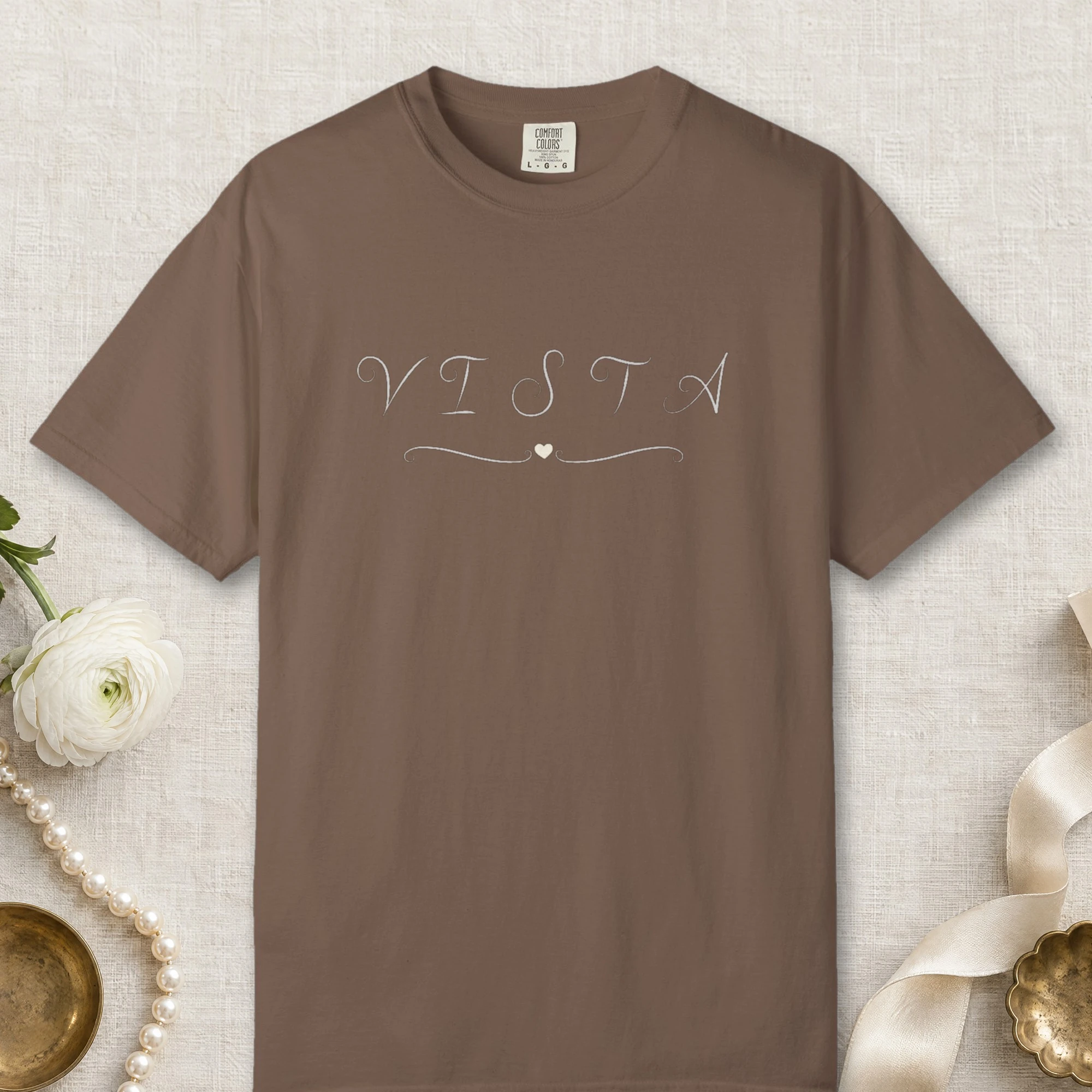 Vista Swirl Heart design on a Espresso Comfort Colors 1717 tee, laid flat