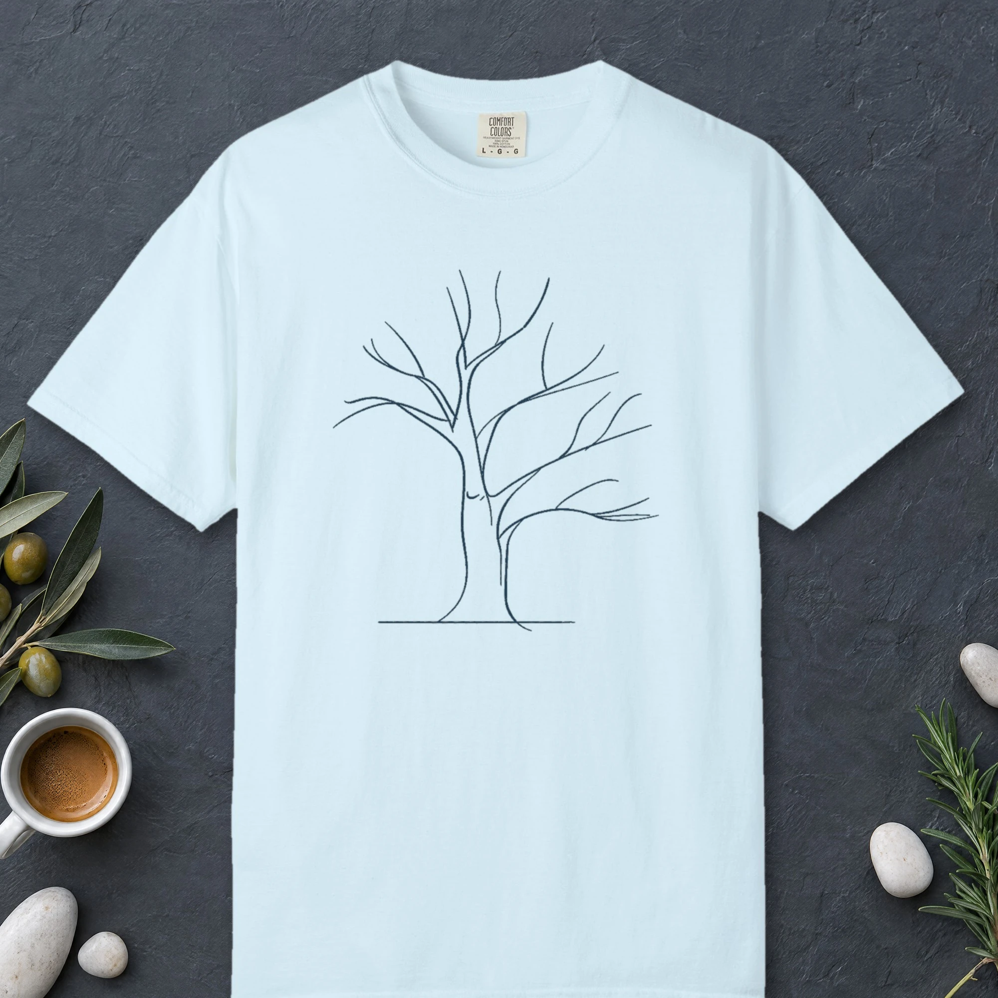 Wide Winter Tree design on a Chambray Comfort Colors 1717 tee, laid flat