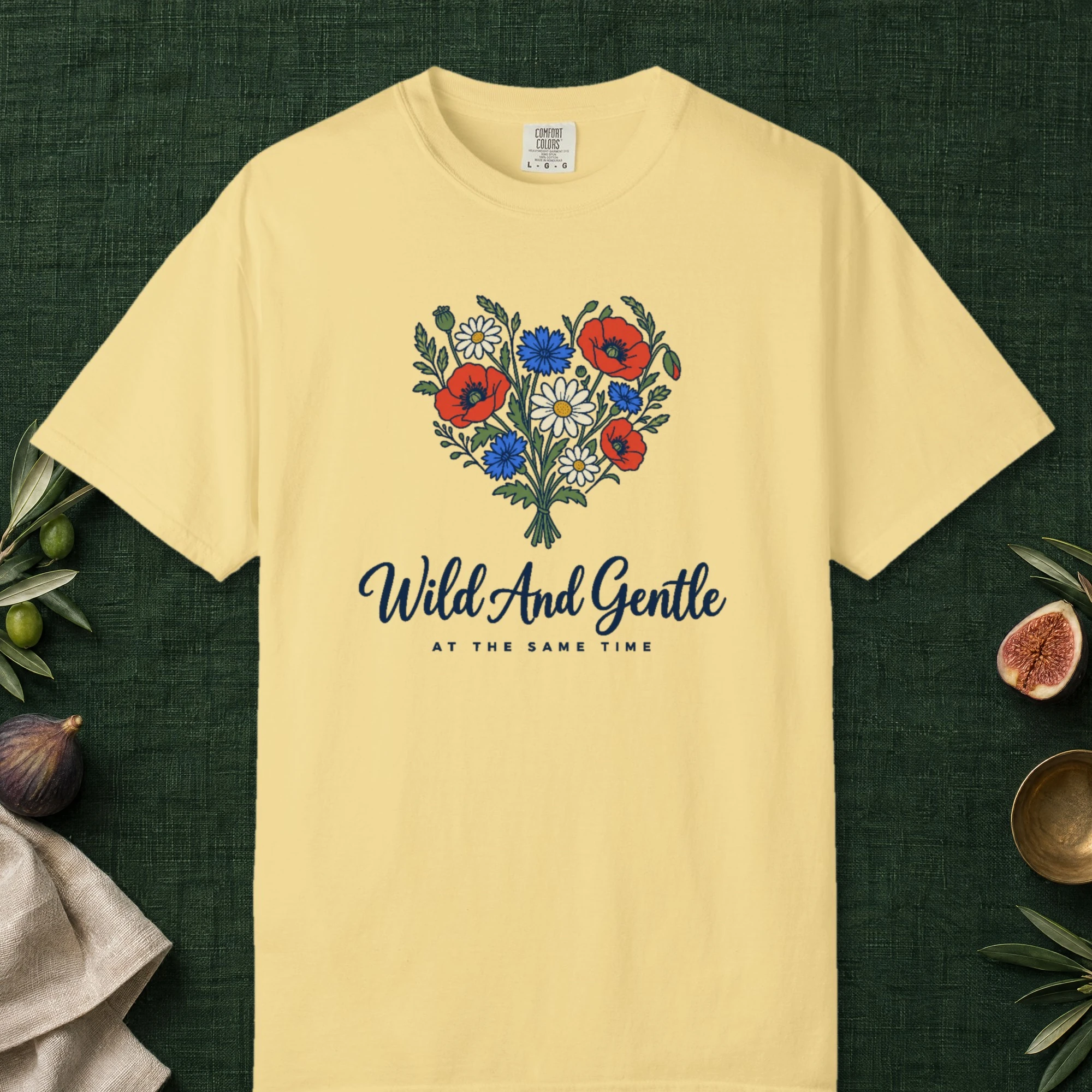Wild and Gentle design on a Butter Comfort Colors 1717 tee, laid flat