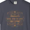 Close-up of the Wise and in Love print on a Navy Comfort Colors 1717 tee